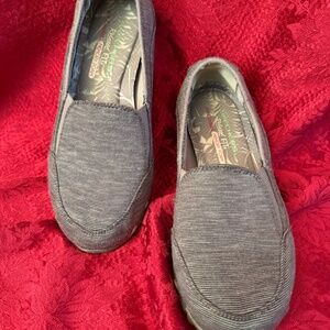Skechers Gray Canvas Slip on Shoes in a size 8.5